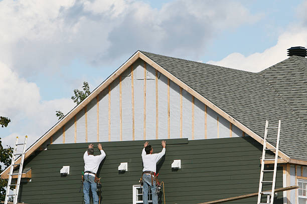 Professional Storm Damage Siding Repair technician working in Exton, PA